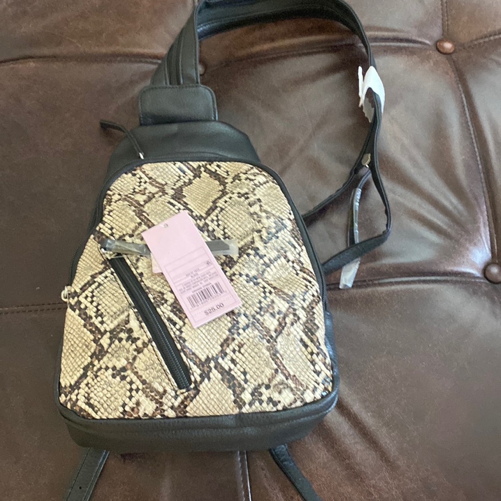 Brand new with tags, over shoulder/small backpack bag